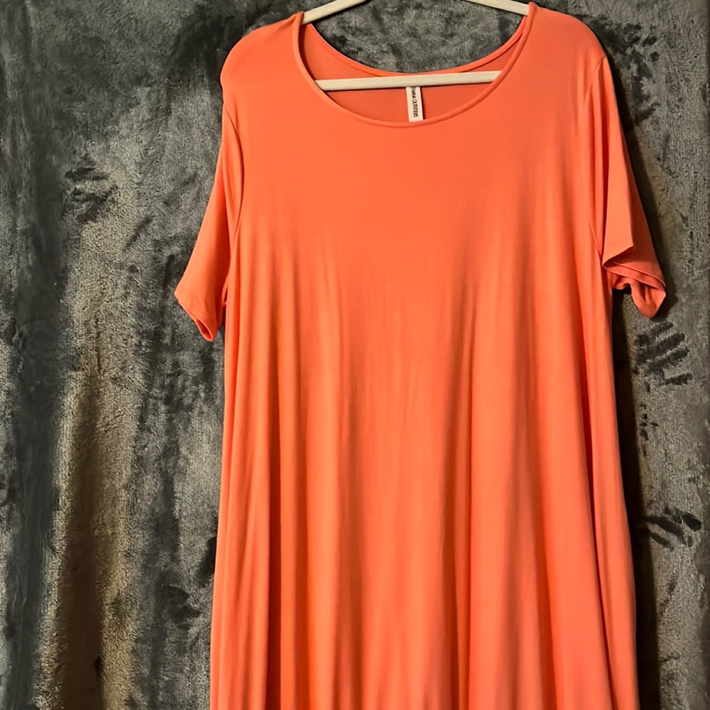 Coral peachy orange ruffle bottom midi dress with pockets